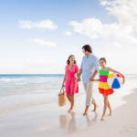 family enjoying beach life